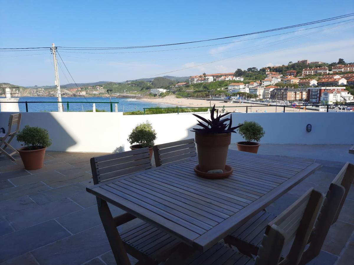 Apartamentos El Muelle 코밀라스 외부 사진