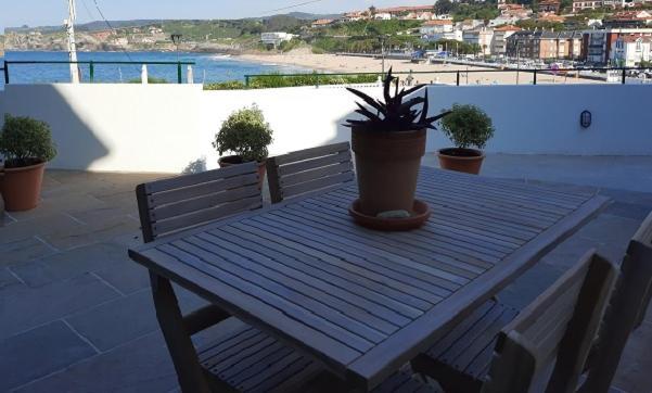 Apartamentos El Muelle 코밀라스 외부 사진