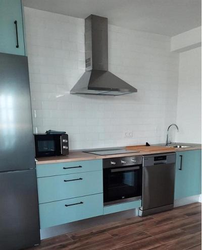 Apartamentos El Muelle 코밀라스 외부 사진
