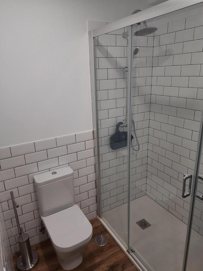 Apartamentos El Muelle 코밀라스 외부 사진