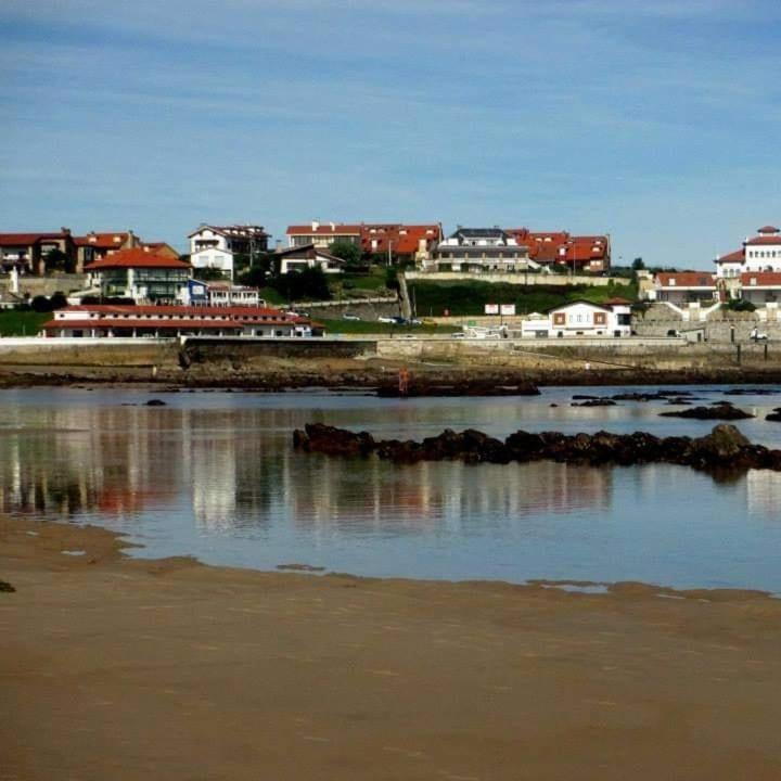 Apartamentos El Muelle 코밀라스 외부 사진