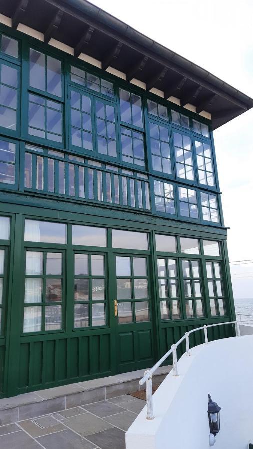Apartamentos El Muelle 코밀라스 외부 사진